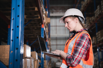 Logistic distribution center or Inventory hub warehouse concept, Female worker working stock check at store