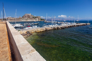 Kerkyra. Greece. View of the coastline and ships on a sunny day.