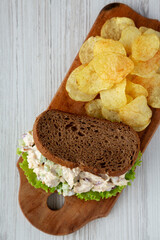 Homemade Chicken Salad Sandwich with Potato Chips, top view. Flat lay, overhead, from above. Copy space.