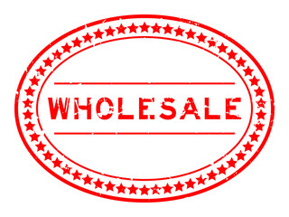 Grunge red wholesale word oval rubber seal stamp on white background
