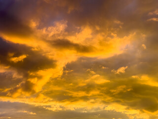 Naklejka na ściany i meble cloudy sky at sunset nature background abstract