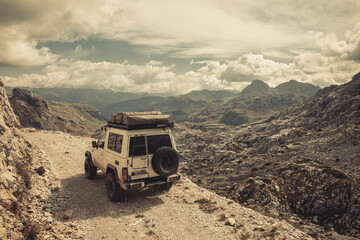 Off road 4x4 car on a high mountain pass