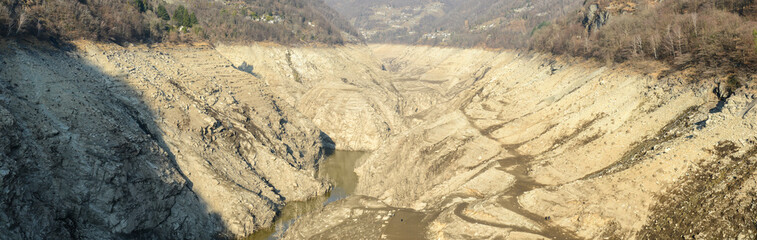 The empty basin of Verzasca dam on Switzerland