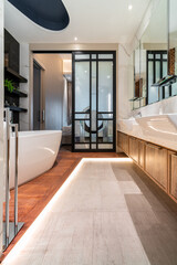 modern bathroom interior design with white marble  tiles, isolated bathtub stained glass door