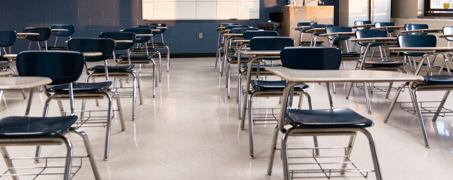 Desks seperated in a high school classroom