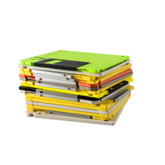 stack of multi-colored diskettes on white background. Colored floppy disks.