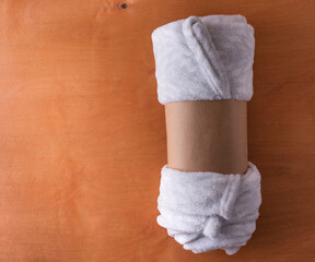 white new plaid folded and tied with kraft paper