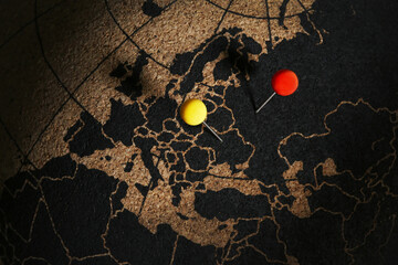 Europe map with Cartographic pins of Ukraine and Russia. Concept of military conflict and War...