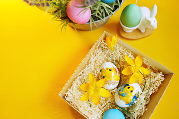 easter eggs in a basket. Christianity. Celebrate holidays. Yellow colours 
