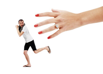 Fear of commitment. A young man trying to run away from a giant hand wearing a wedding ring.