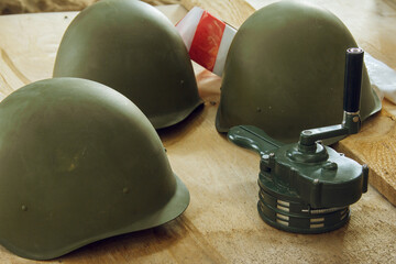Military ammunition. Military helmets and hand siren. manual siren alarm
