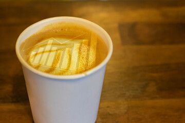 Hot coffee with business graph in white cup healthy breakfast