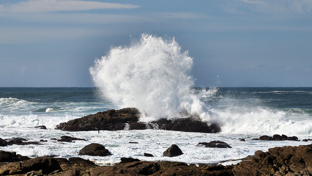 waves crashing on rocks