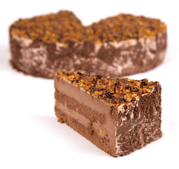 Hazelnut Chocolate Cheesecake. A slice of chocolate cheesecake on a white background
