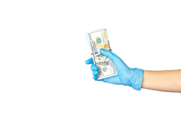 Hand in blue medical glove holding money on white background. Cropped Hand in blue medical glove Hold Paper Currencies On White Background.