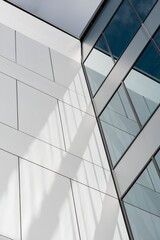 Detail of modern architecture buildings. Symbol of real estate, business, prosperity. Beautiful sunny day.