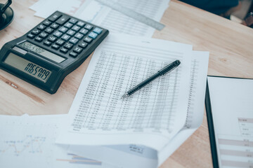 Naklejka na ściany i meble calculator, company data, document and report on desk office. Accounting business concept.