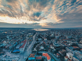 Fototapeta premium Panoramic Dawn view of Varna city. Famous monument of comunist party and beatiful skyline . Colorful morning scene of Bulgaria, Europe. Traveling concept background.