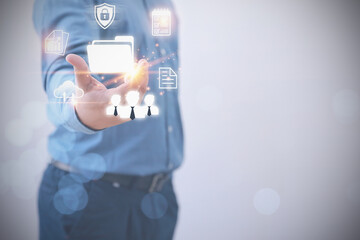 A Businessman holding a file document icon virtual online with business icons. Database and process automation to manage files, knowledge, and Document of corporate. Document Management System.