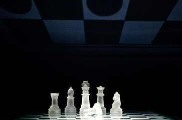 Glass chess on glass chessboard	