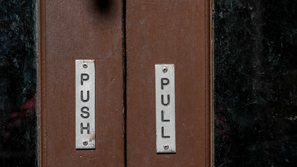 Close up from push and pull text on doors