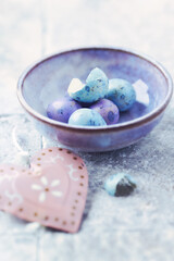 Simple Easter Decoration. Bright stone background. Soft focus. Close up.