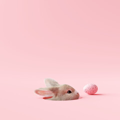 Easter bunny peeps out of the hole on pastel pink background. 3d rendering