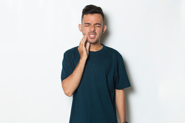 man with toothache; portrait of man suffering from toothache pain, tooth decay, tooth sensitivity