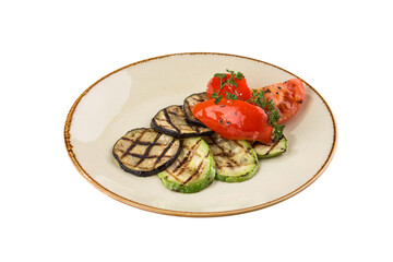Grilled vegetables peppers, zucchini, tomatoes and eggplants isolated on white background