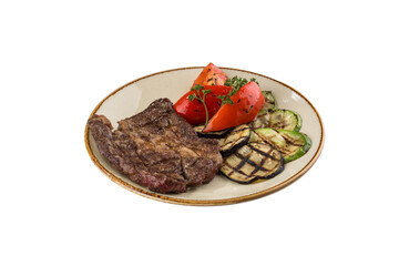 grilled beef steak and vegetables pepper zucchini eggplant isolated on white background
