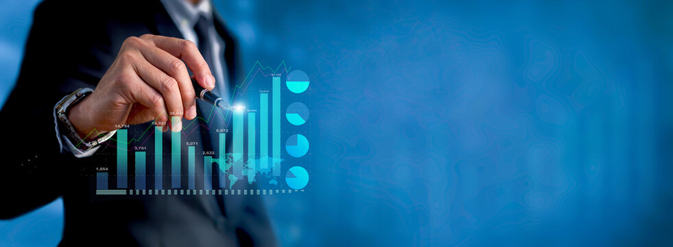 Businessman pointing arrow graph growth and financial network connection, analyzing report data to increase sales and revenue profit to achieve business investment goal in global economic situation.