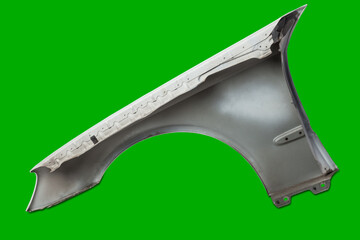 White plastic fender on a green chroma key isolated background in a photo studio for sale or replacement in a car service. Mudguard on auto-parsing for repair or a device to protect body from dirt