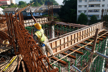 KUALA LUMPUR, MALAYSIA - JULY 7, 2021: Beam and column formwork installed at a construction site....