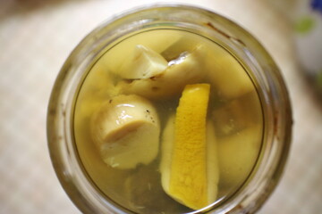 jar of pickled mushrooms on the table