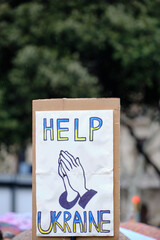help ukraine poster at a demonstration against the war in ukraine.