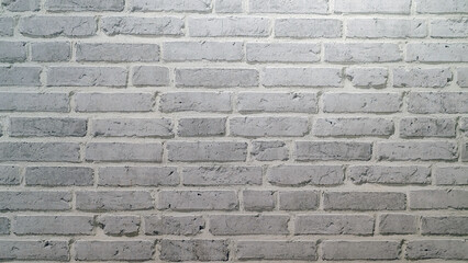 White brick wall texture background made by pattern paper. Wall texture background flooring rock stone old pattern clean concrete grid uneven bricks design stack. Background for the wall in LOFT style