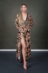 Shapely blonde at the studio session. Model