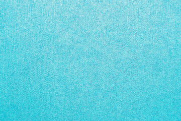 Light turquoise blue background with paper fabric canvas texture for layout, collage, coaster. pure...