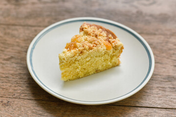 Fruit bael cake on wooden background, Homemade dessert recipe by fruit in sugar syrup.