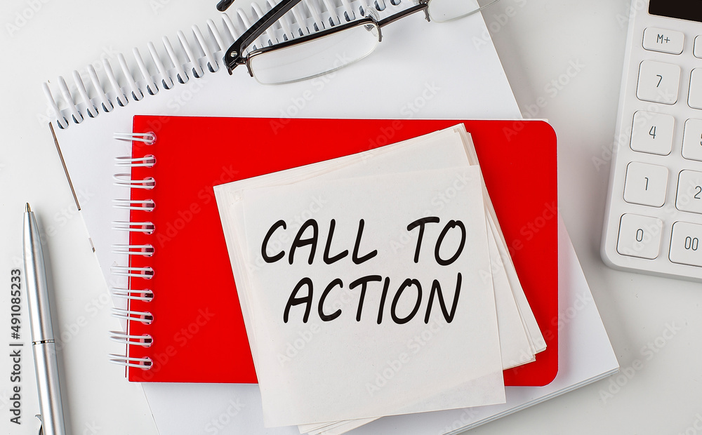 Poster call to action word on sticker on notepad with pen and calculator