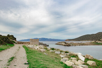 Knidos was a Greek city in ancient Caria, located by sea. The ruins contain a large number of buildings belonging to the Byzantine style. Datca, Mugla, Turkey. No people in photo.
