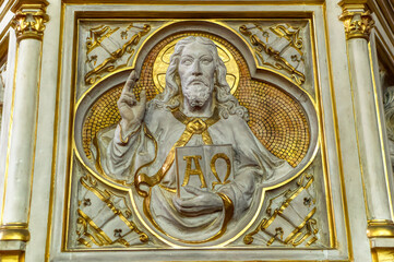 Traditional bas relief decoration with gold coating used frequently inside catholic churches.