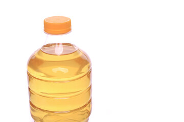 Front view of cooking oil in plastic bottle with negative space isolated on white background