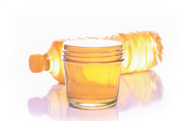 Front view of cooking oil bowl full of reflection shadow isolated on white