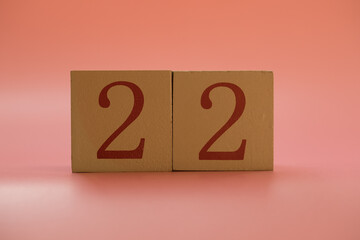 Numbers or dates on wooden cubes, twenty-two