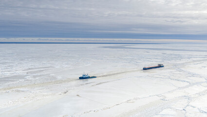 aerial, assisting, baltic, bay, beach, blue, boat, cargo ship, clouds, coast, cracked, cruise, drone, estonia, ferry, float, frozen, guarding, harbor, harsh environment, holiday, ice, icebreaker, land