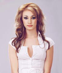 Shes gorgeous. Portrait of a gorgeous young woman posing against a lilac background.