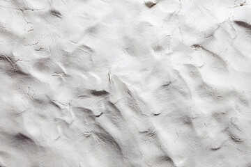 finger marks on a slab of gray clay