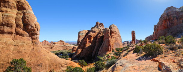 Panoramic view of dramatic rock formations and towers in Arches National Park 