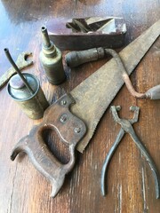 old disused carpentry tools and oil cans